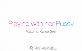 Karlee Grey is rubbing her lover's dick while listening to him.