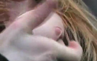 Dirty blonde slut girl showing her big titties
